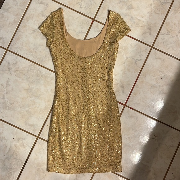 Charlotte Russ Gold sequin party dress. Gold lipstick. Gold nail Polish - Picture 6 of 9